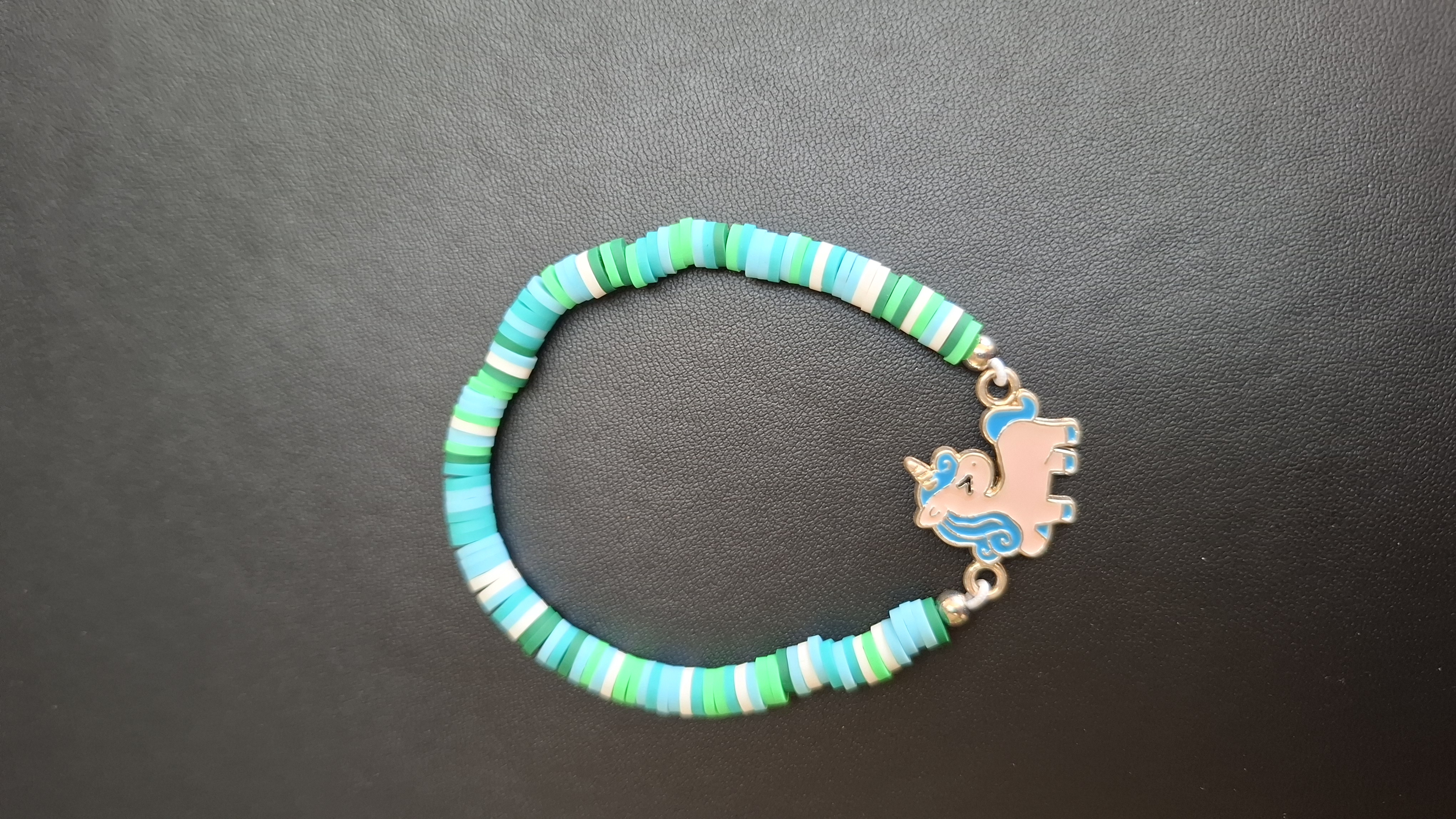 armband groen/blauw met eenhoorn