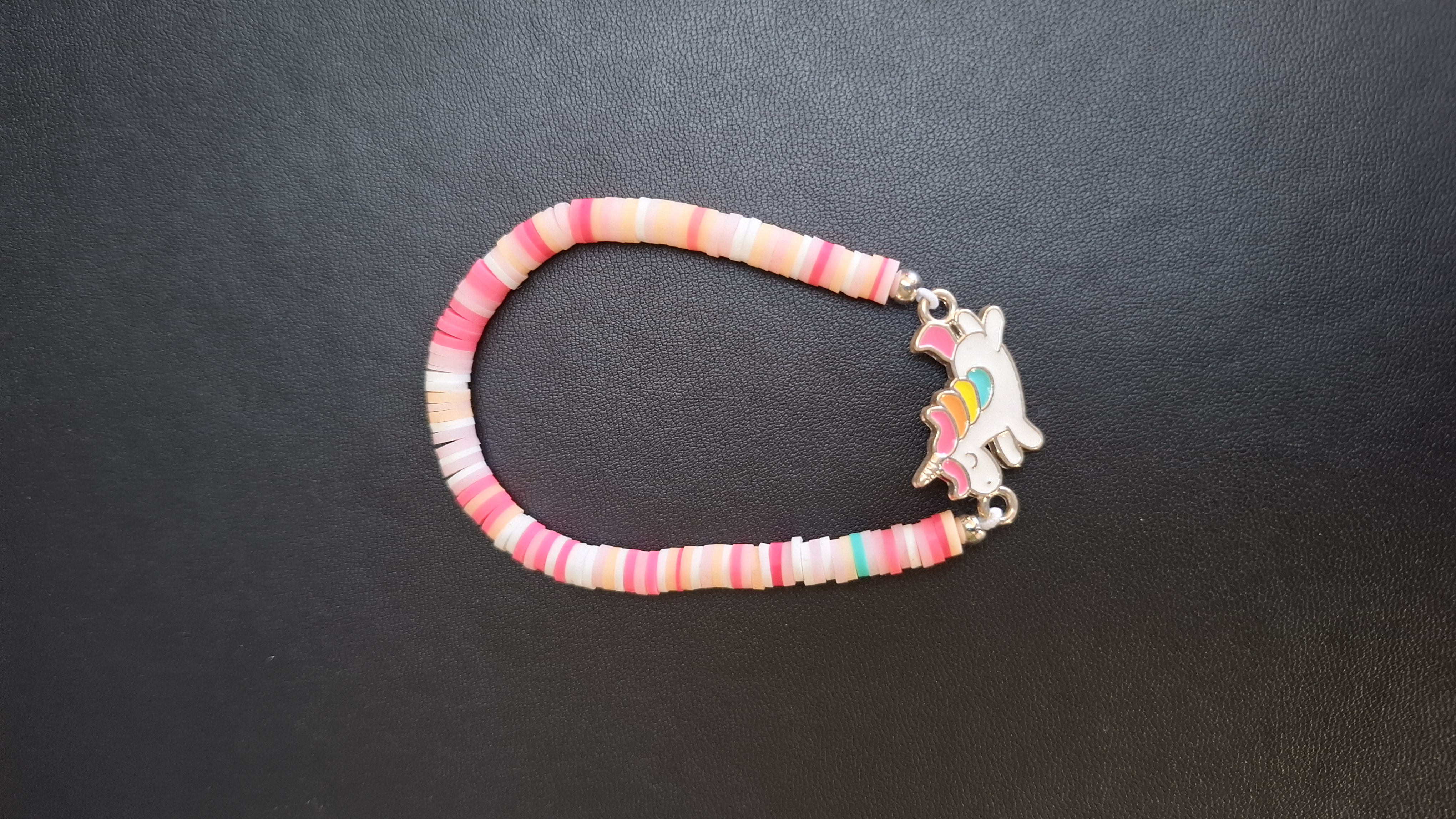 armband roze/oranje wit met eenhoorn