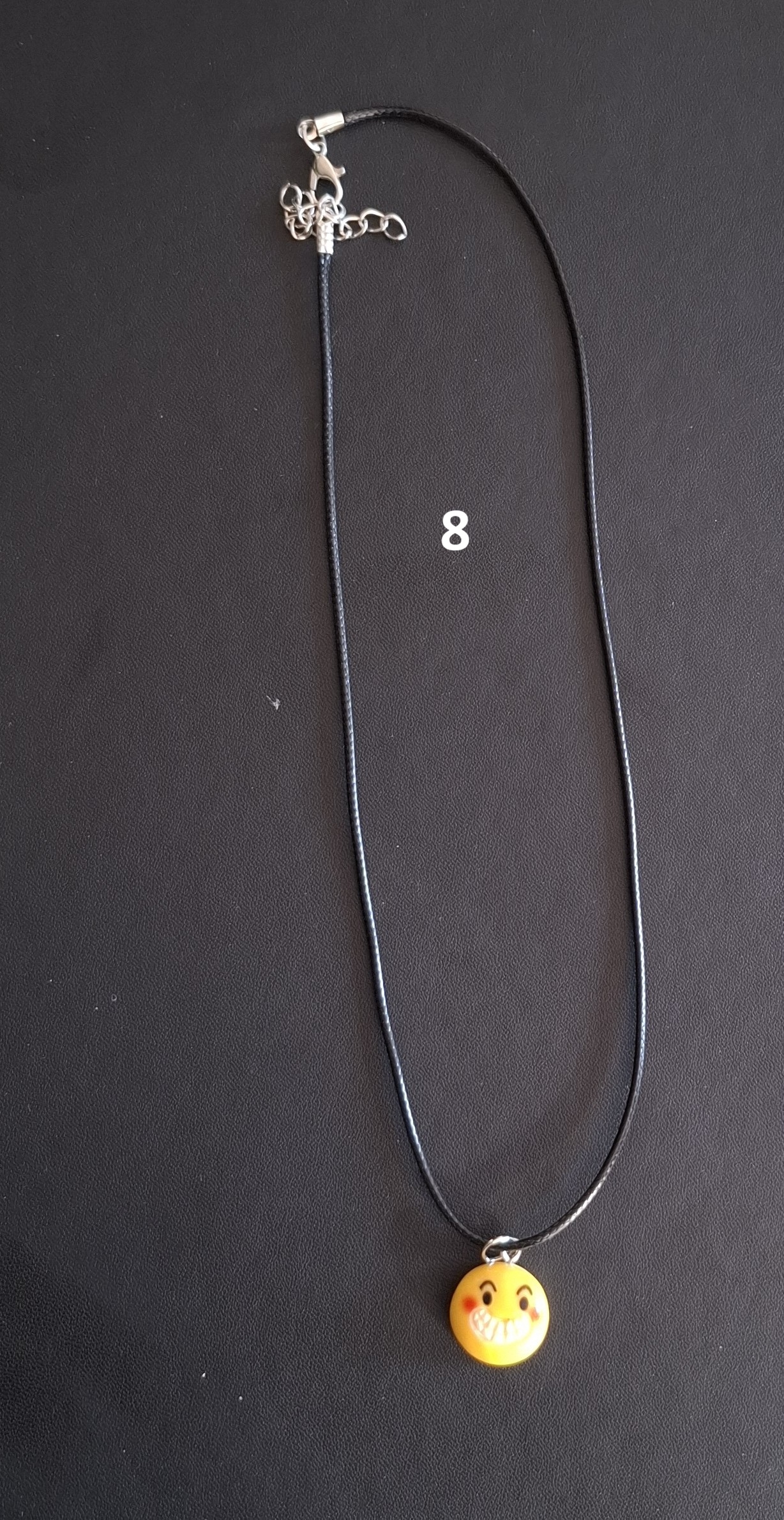 zwarte kunststof ketting gele smiley nr 8