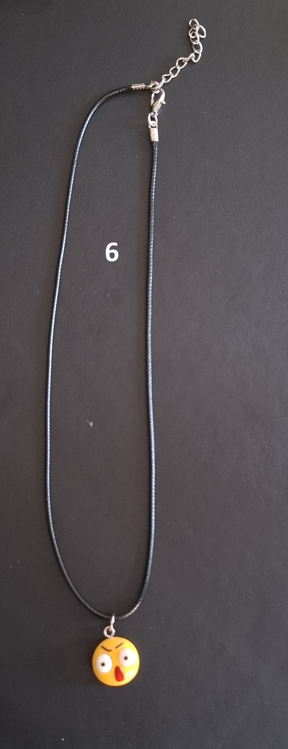 zwarte kunststof ketting gele smiley nr 6